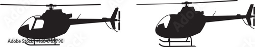 Two helicopters in silhouette side by side