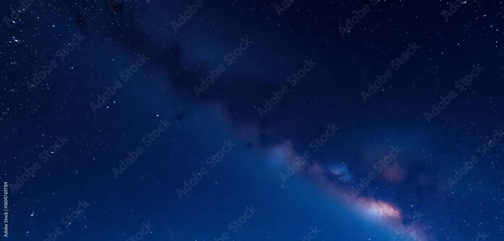 Fototapeta premium Starry night sky, Milky Way galaxy arcing overhead, constellations, dark