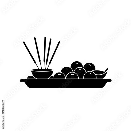black incense sticks and fruits on tray clip art preview