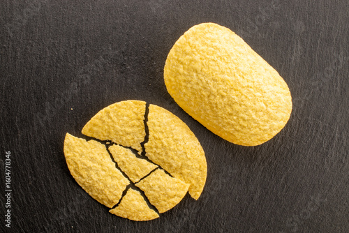 Crispy potato chips, top view, macro.