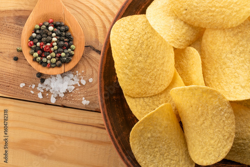 Crispy potato chips, top view, macro.