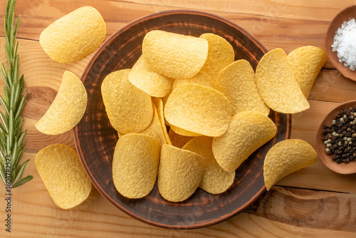 Crispy potato chips, top view, macro.