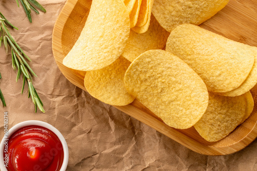 Crispy potato chips, top view, macro.