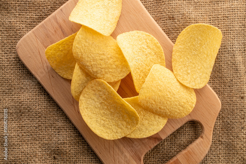 Crispy potato chips, top view, macro.
