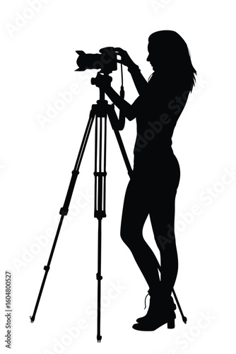 silhouette of a woman taking a photo using trip