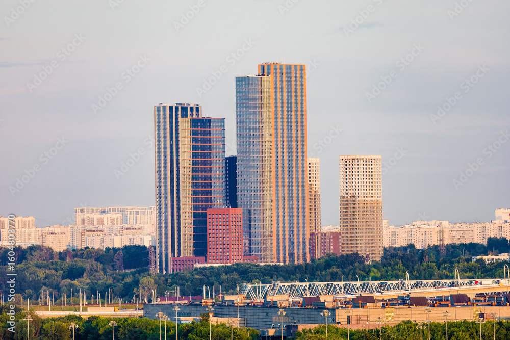 Fototapeta premium Colorful urban landscape with tall residential skyscrapers