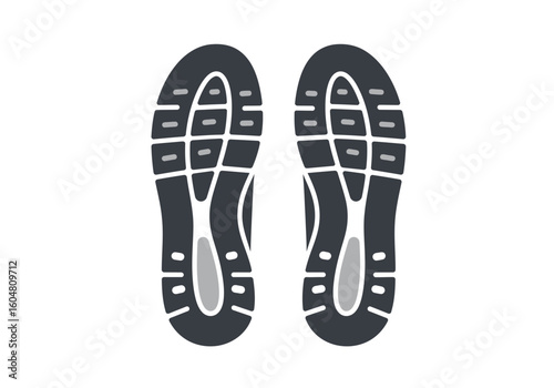 Pair of Dark Gray Running Shoe Soles with Textured Tread.