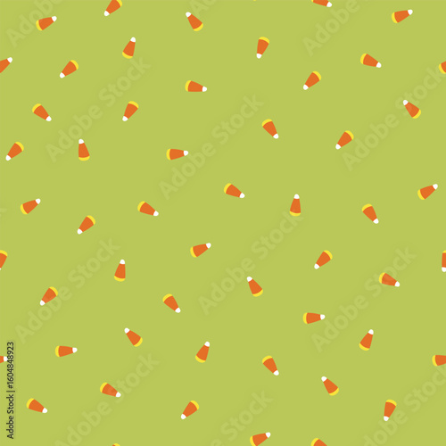 Traditional Autumn Candy Corn Tossed in a Non Directional Pattern on a Halloween Lime Green Background creating a seamless pattern print