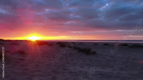 Dramatic sunset over a sandy beach