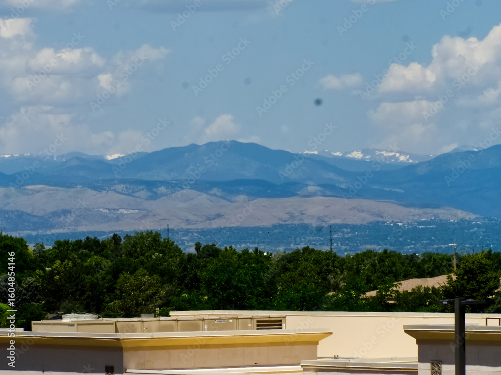 Fototapeta premium Trees, Commercial Buldings, and Mountains!