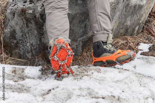 Crampon or Microspikes is a traction device attached to footwear to improve mobility on snow and ice during ice climbing, travel on snow and ice, glaciers,  snowfields and icefields, snow slopes.