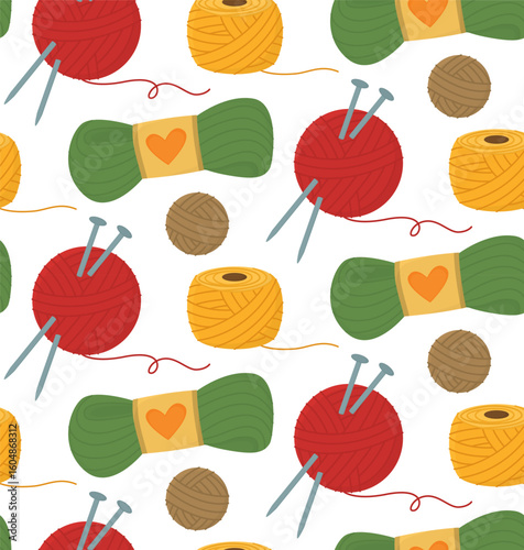 Seamless background with cozy yarn balls. Pattern with colorful threads and knitting needles