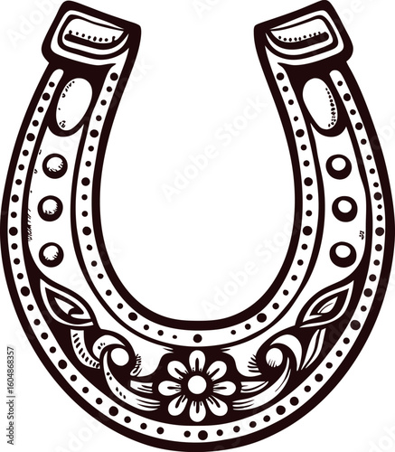 Ornate horseshoe illustration with floral and dotted patterns in vintage engraved on white background