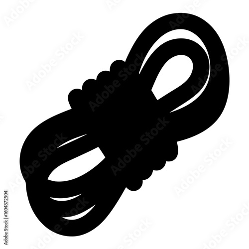 Black rope rolled in loops and placed on a white background
