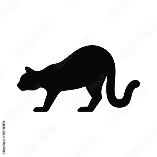Black silhouette of a cat in a crouching pose