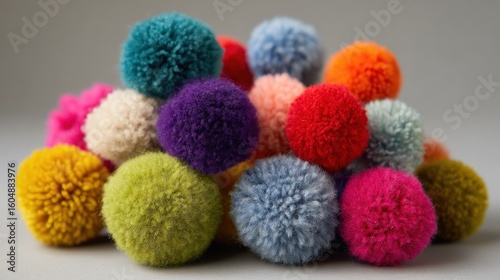Colorful pom-poms piled high