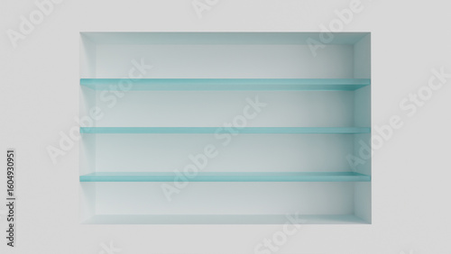 Three glass wall shelves in the interior in a niche on a white background as a template for placing goods, decorative elements, cosmetics or design