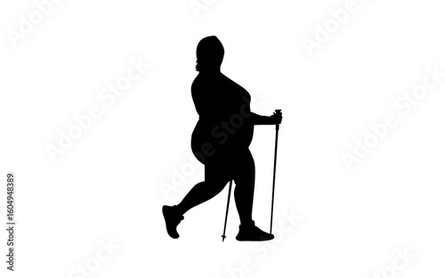 Silhouette of a plus-size woman hiking with trekking poles, showcasing an active lifestyle.