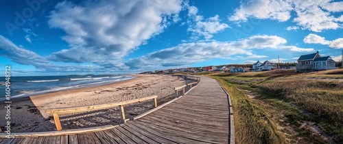Scenic Coastal Boardwalk View in Prince Edward Island, Canada, with Blue Sky and Ocean, perfect