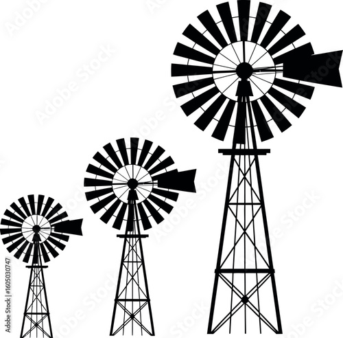 Three black windmills of varying sizes against a white background agriculture farm