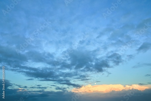 Sky replacement of New Zealand clean blue sky, white clouds and the moon.