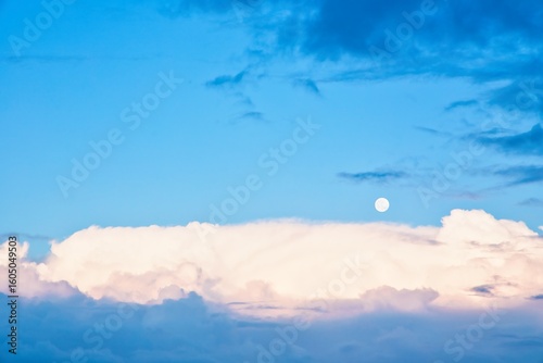 Sky replacement of New Zealand clean blue sky, white clouds and the moon.