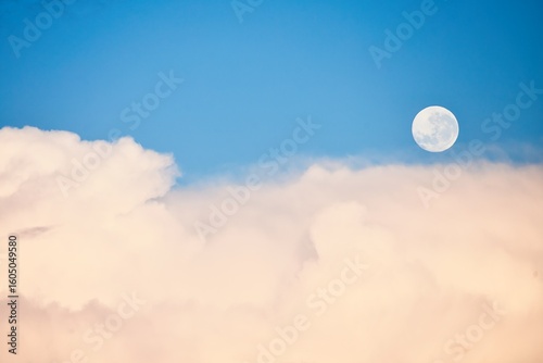 Sky replacement of New Zealand clean blue sky, white clouds and the moon.