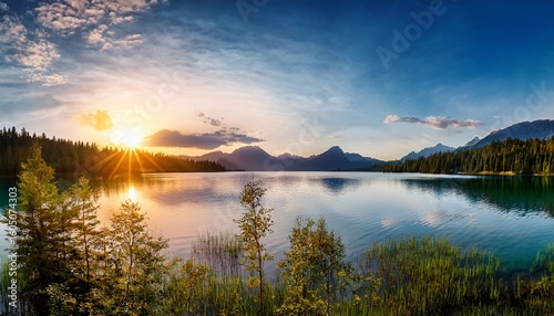 scenic view of a lake at sunset