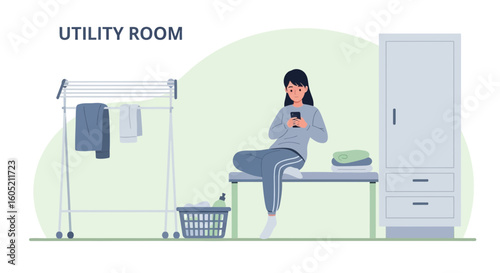 Woman Using Mobile Phone Sitting In Modern Utility Room Interior