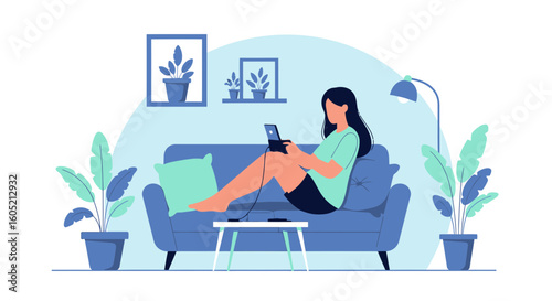 Young Woman Relaxing At Home Using Laptop And Enjoying Leisure Time