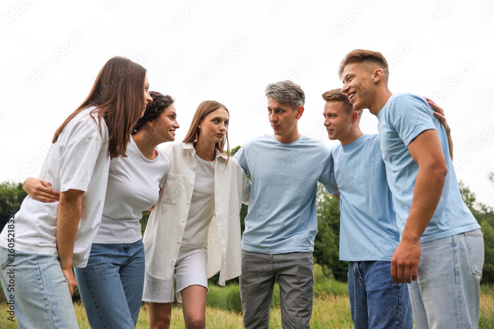 Team building. Group of happy people together outdoors Team building. Group of happy people together outdoors