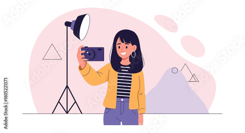 Young Female Photographer Capturing Images With Professional Lighting Equipment