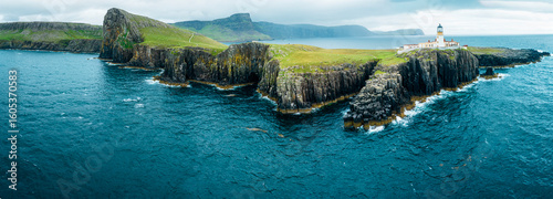 Aerial view of Neist Point, a promontory on the Isle of Skye, Scotland, famous for its lighthouse and sheer cliffs. UK