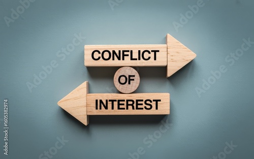 Conceptual image representing conflict of interest with wooden blocks and arrows on a blue background.