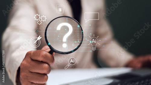 Concept of finding an answer questions in business and lifestyle by Ai technology. Businessman holding magnifying glass with question marks for everything. Using Ai technology to find information.