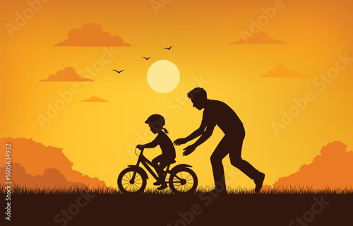 Father teaching daughter to ride a bicycle at sunset, silhouette style