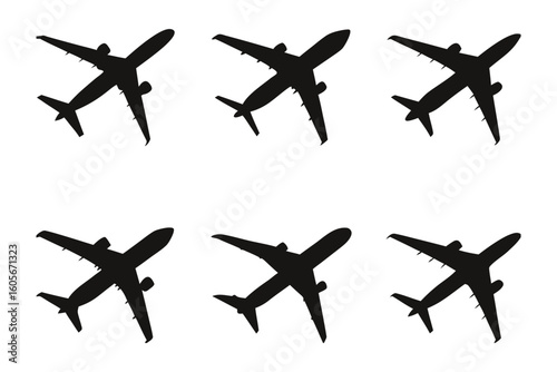 Airplanes in Silhouette: A series of six meticulously crafted aircraft silhouettes gracefully poised in a monochrome arrangement. Offering a sense of freedom, movement, and the allure of flight.