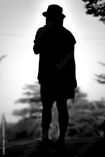 Silhouette of Person Wearing Hat Gazing at Scenic View