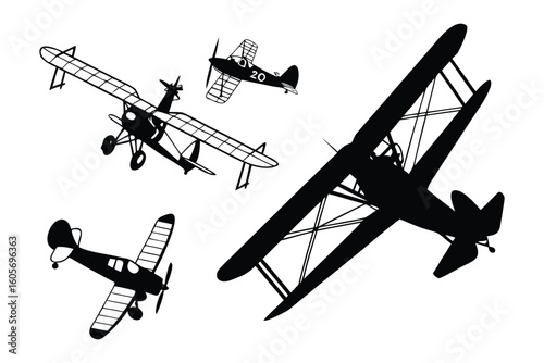 Vintage Aeroplanes Silhouette: A monochrome display of classic airplanes in flight, evoking a sense of nostalgia and the golden age of aviation.