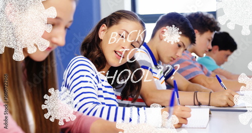 Five kids using spiral notebooks with blue pens in class, showing “BACK TO SCHOOL??” virus graphics