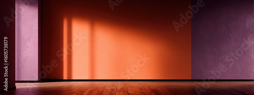 Empty room with two-toned walls and wooden floor.