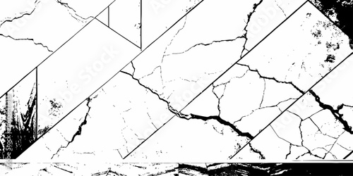 white surface with a network of black cracks across the surface area.