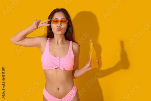 Pretty young woman in swims...