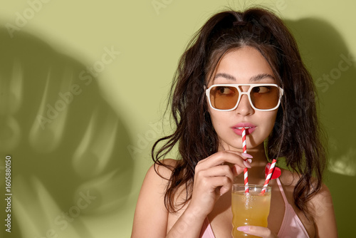 Pretty young woman in swims...