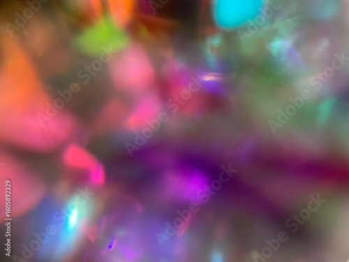 abstract background with colorful lights jewelry crystal diamond sparkles texture 