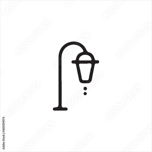 Black outline of a vintage street lamp with dots below lamp post outdoor lighting