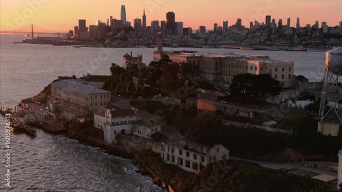 Alcatraz Island, USA, at sunset. The former prison is now a tourist destination. The city of San Francisco is in the background.
