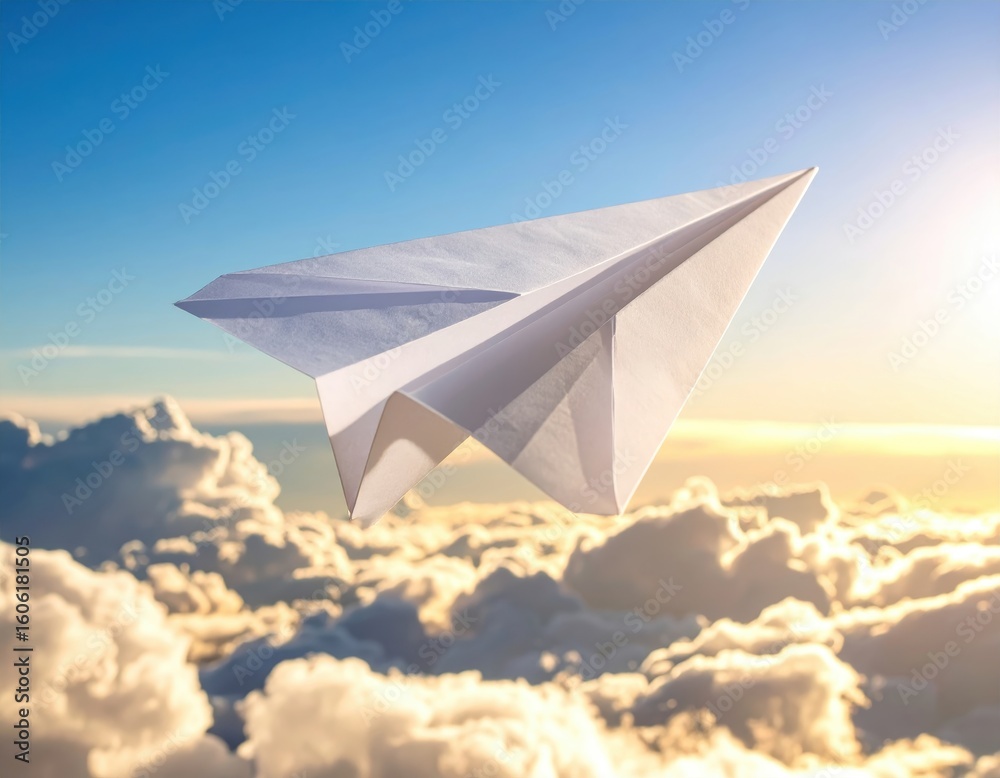 Fototapeta premium ** A paper airplane glides above fluffy clouds during sunset, capturing a sense of freedom and imagination. **