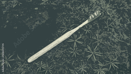 Eco friendly bamboo toothbrush on green foliage for sustainable oral hygiene and zero waste lifestyle concept