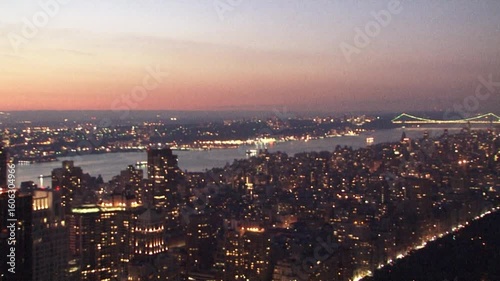 Wallpaper Mural New york city at dusk, with lights sparkling and bridges glowing, aerial view Torontodigital.ca